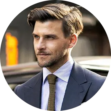 A smiling businesswoman with short brown hair